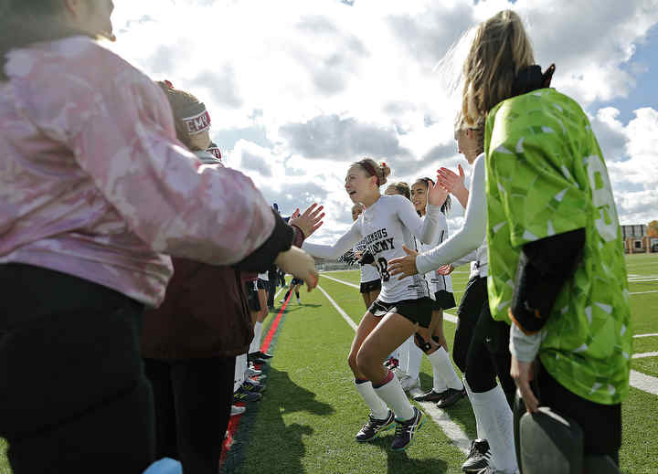 Columbus Academy's Jenny L'Hommedieu dances out prior to the Ohio high school field hockey state championship game against Hudson at Upper Arlington High School.  (Kyle Robertson / The Columbus Dispatch)